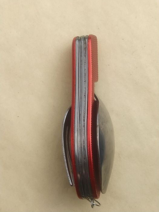 Нож складной для туристов три в одном.