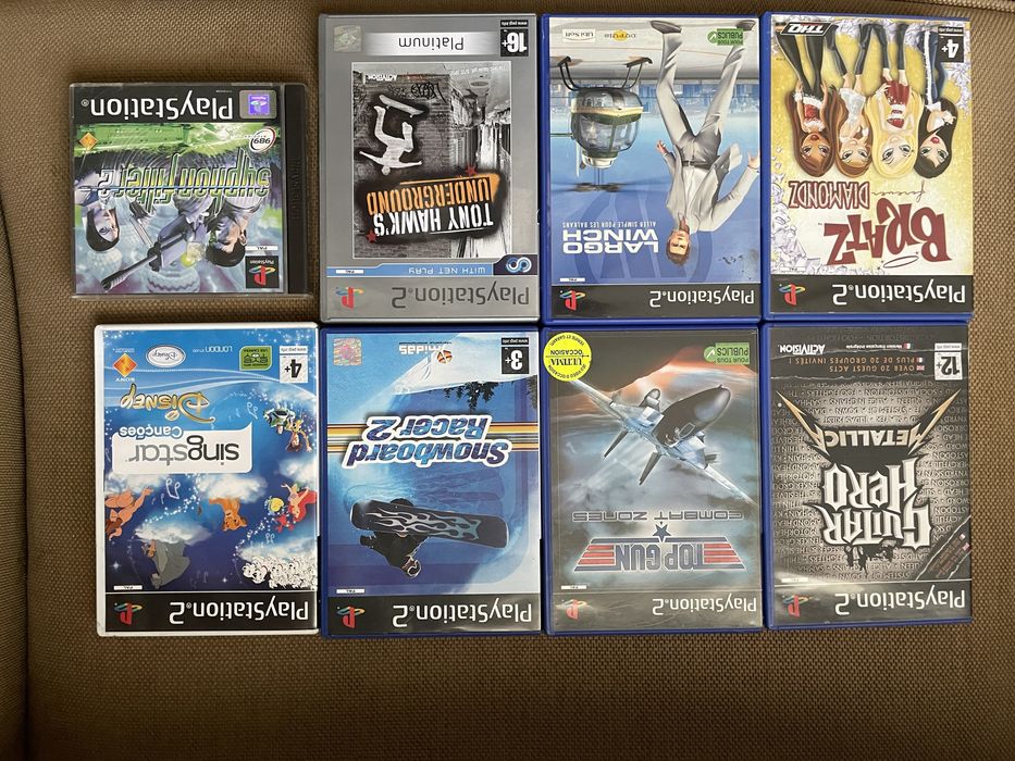 Jogos PS2/PS1 e microfones SingStar