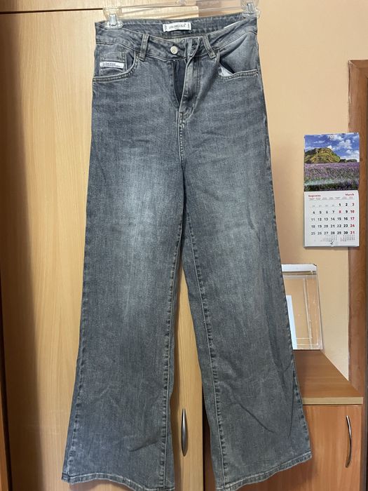 Джинсы клёш