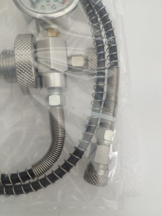 Estação de carga para carabina PCP