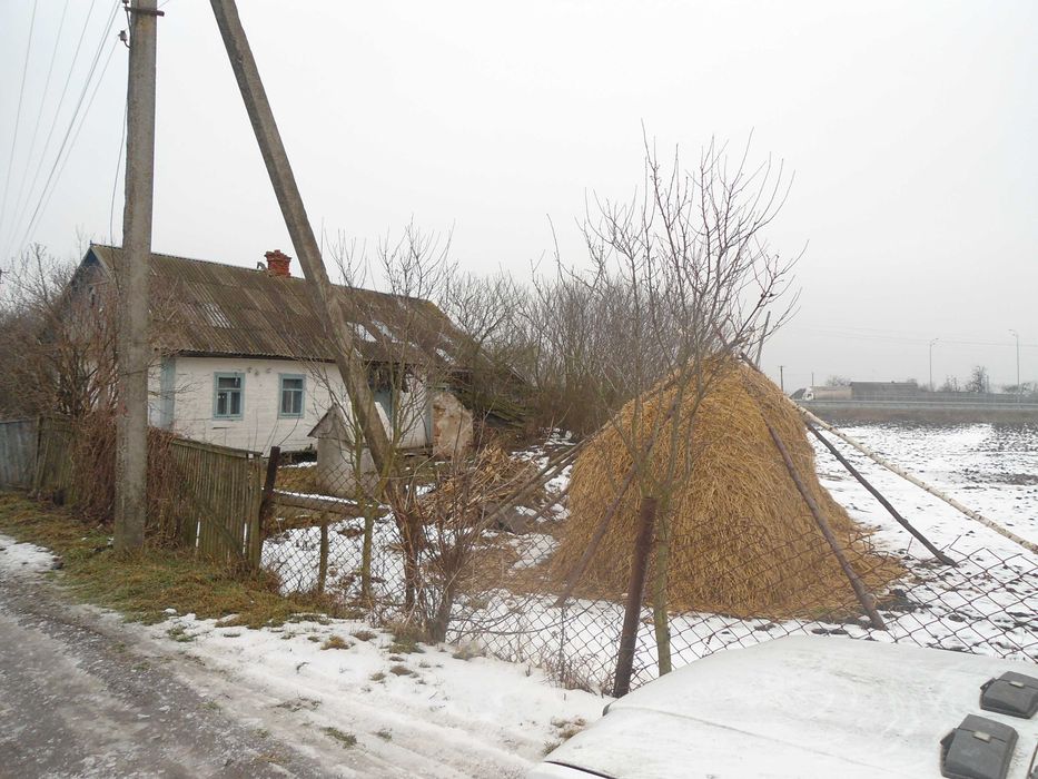 Старовинний дерев`яний будинок