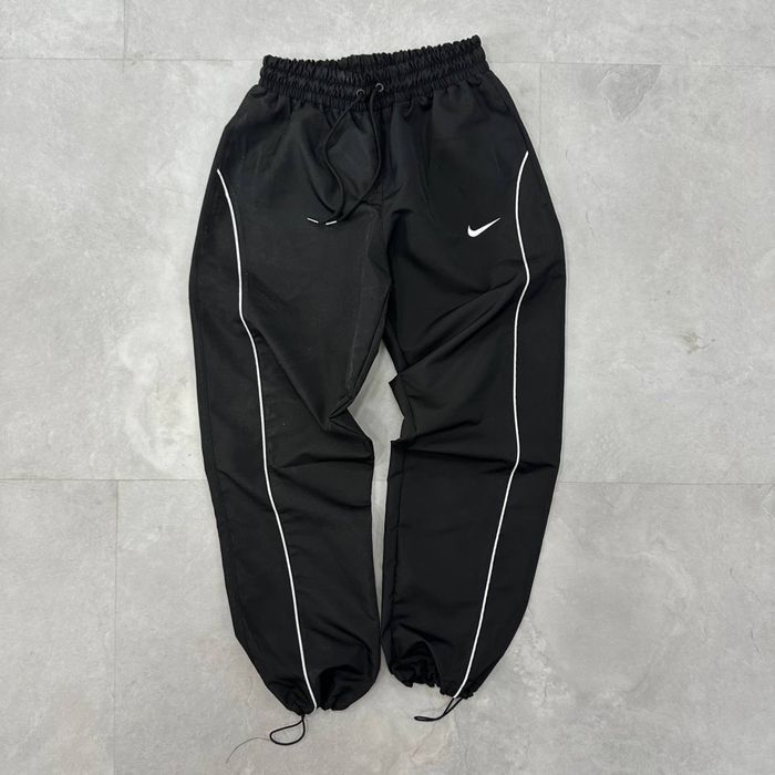 Водонепроникні штани Nike