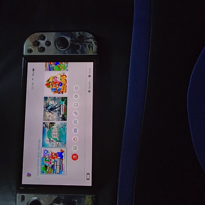 Vendo switch oled branco com garantia e mais 3 comandos