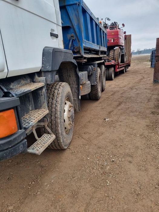Usługi koparką koparko-ładowarką transport