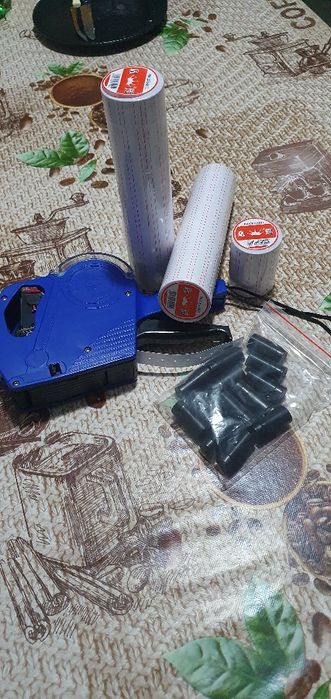 Itiqutadora com rolos e etiquetas