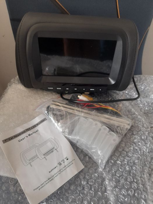 Encosto de cabeça com monitor