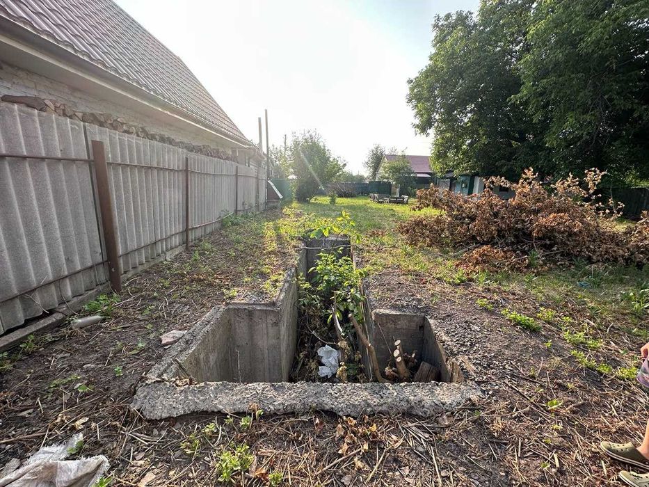 Будинок біля центру з ділянкою 8 соток