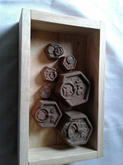 Pesos antigos para balança