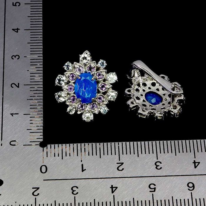 Серьги из серебра 925 пробы с синим огненным опалом 8x6 мм и аметистом-аквамарином.