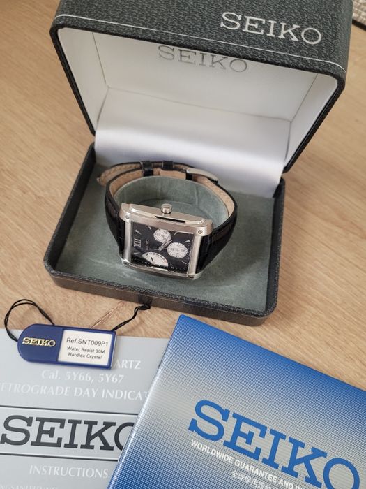SEIKO SNT009P1 kostka RETROGRADE reverse panda