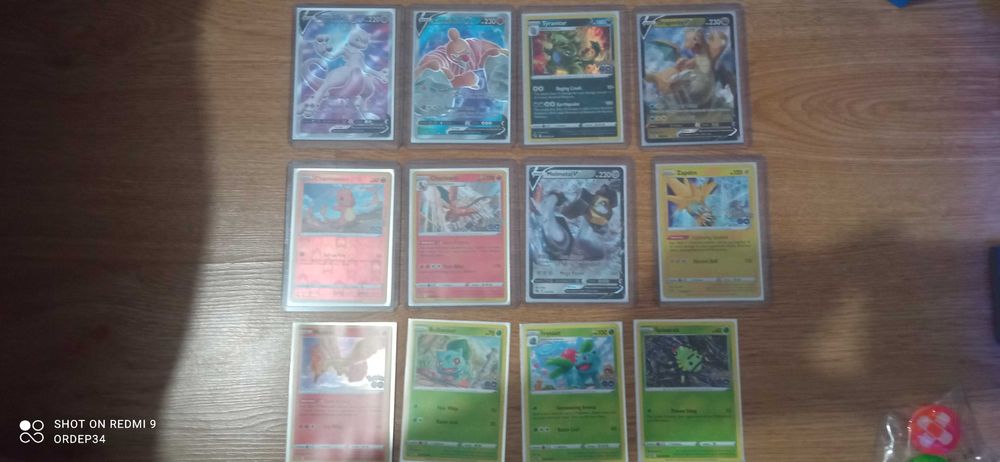 Caixa Elite Trainer Box TGC Pokémon Go  62% da coleção