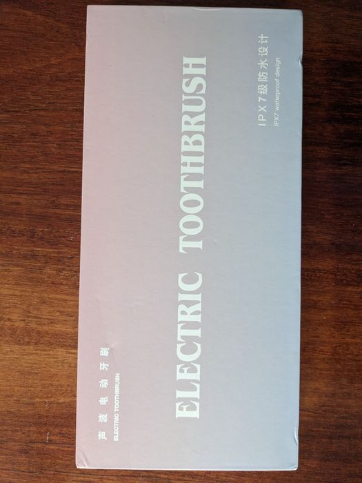 Зубная ультрозвуковая щетка