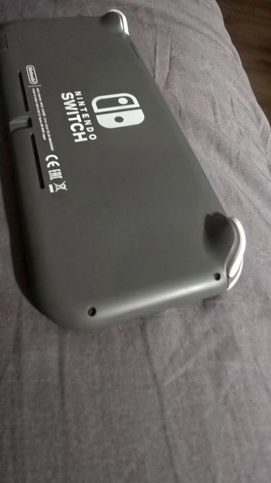 Nintendo Switch Lite (como nova) + capa