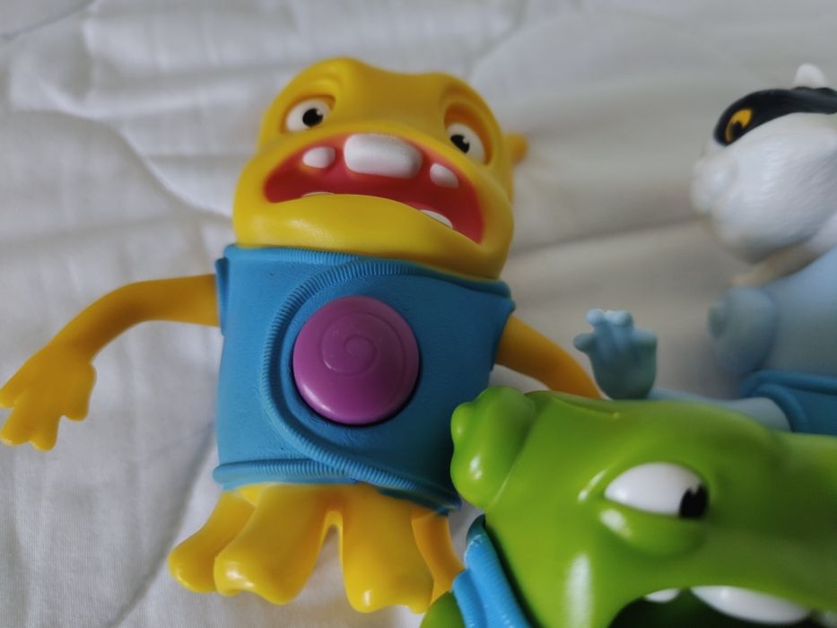 Trzy figurki z happy meal Mc Donalds