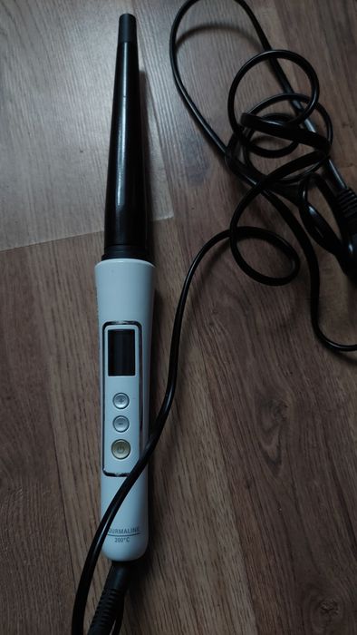 Конусна плойка rowenta