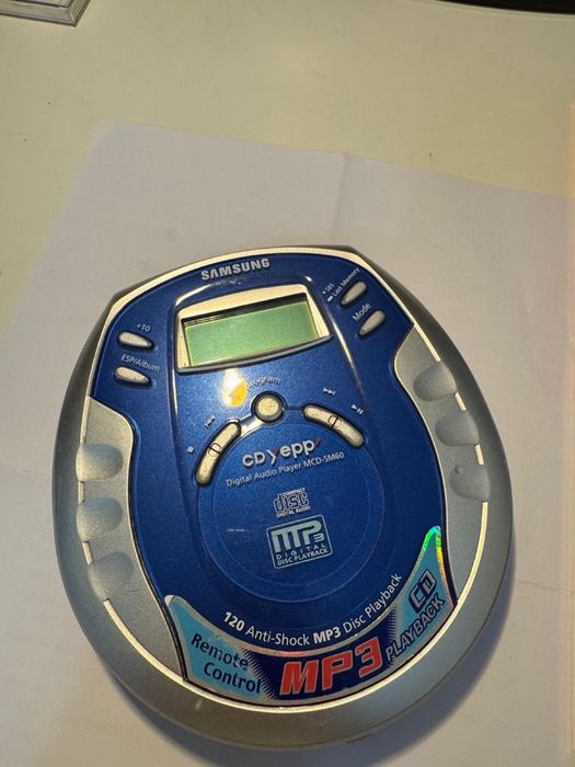 Discman + 3 cd.