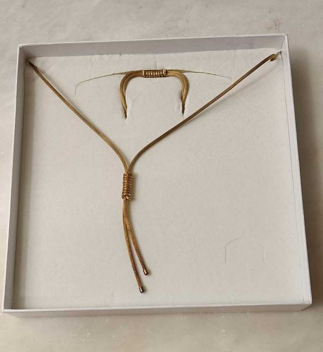 Conjunto novo de corrente e pulseira .