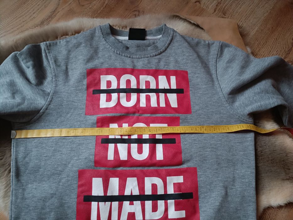 Szara bluza sportowa marki Cropp