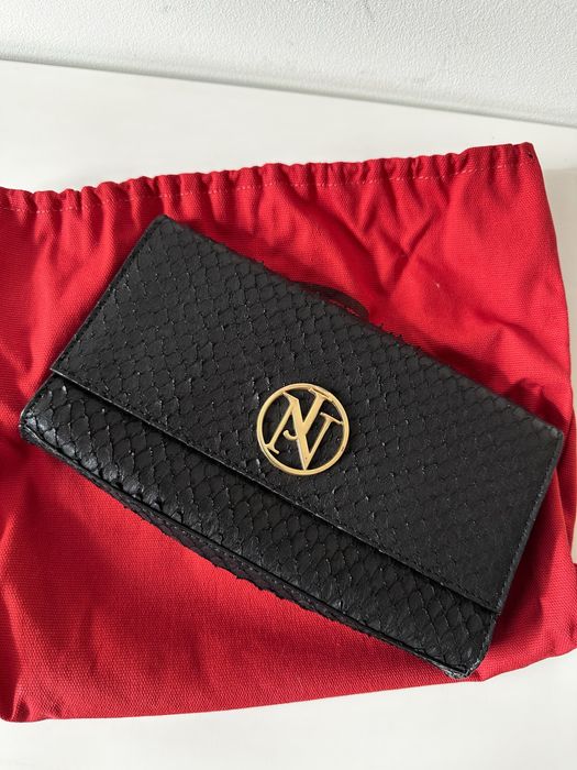 Clutch preta em pele Janiko
