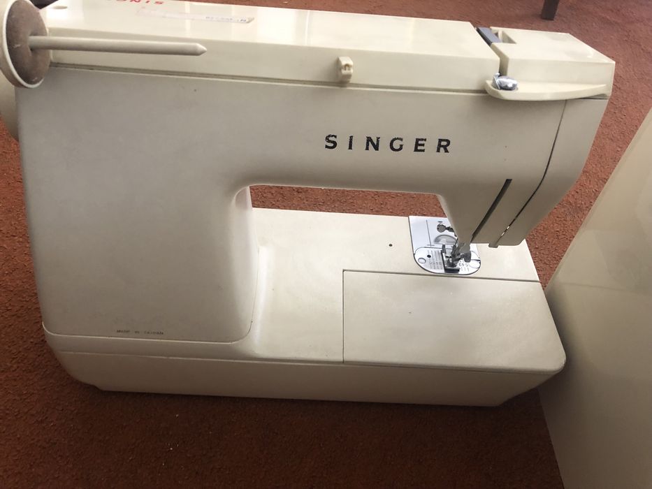 Maquina singer em bom estado