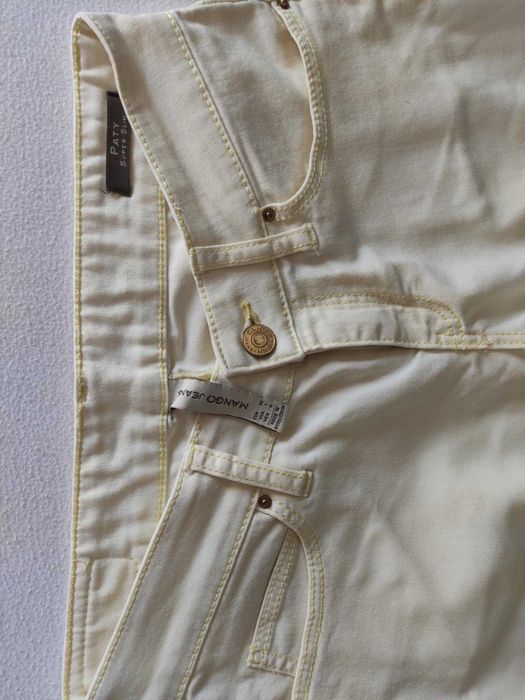 Spodnie Mango pastelowy żółty rozm 32