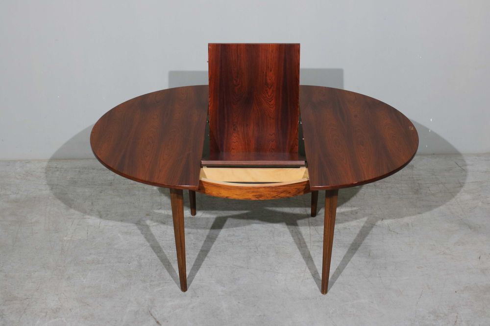 Mesa de jantar redonda extensível em pau santo