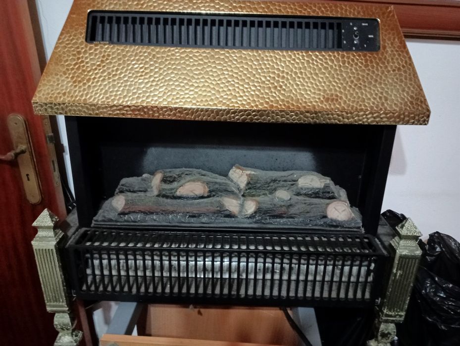 Vendo aquecedor antigo a funciinar muito bem