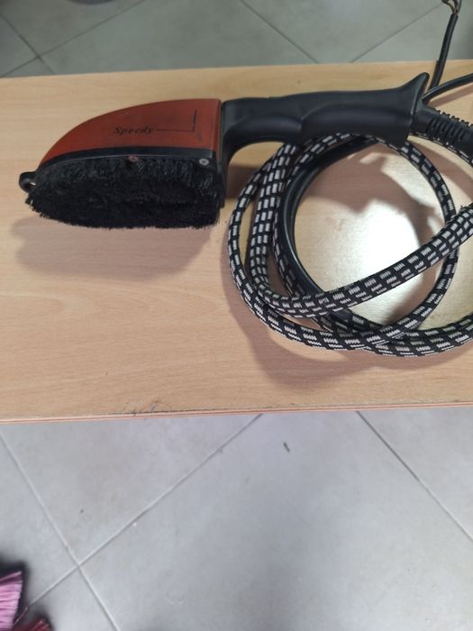 Escova de pasaar a ferro com vapor