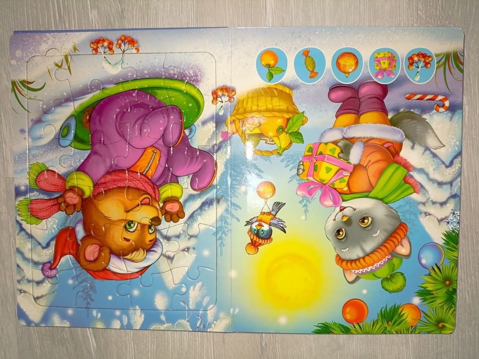 Розвиваюча книга-пазл Зустрічаємо свято з зимовою тематикою