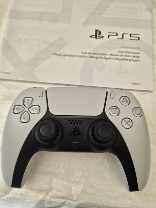 Ps5 com Leitor + Comando oficial  - Pode ser testada  !!