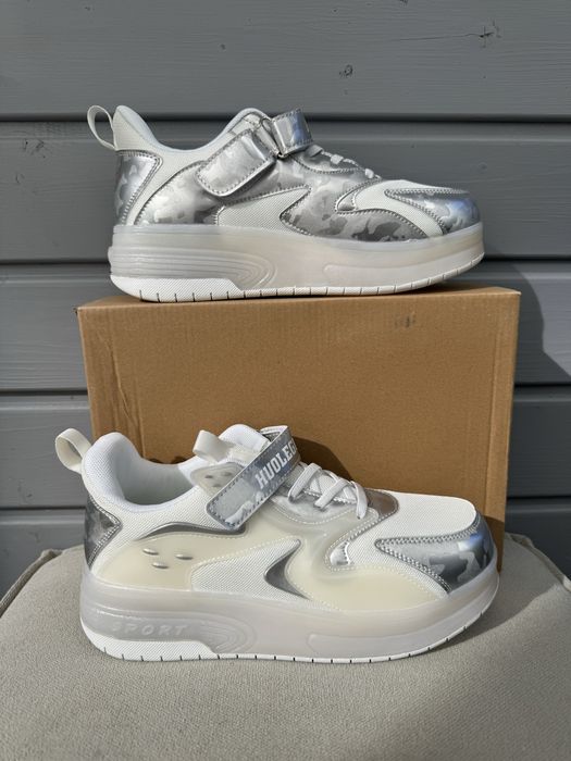 Nowe butorolki bialo srebrne swiecace 40 wrotki