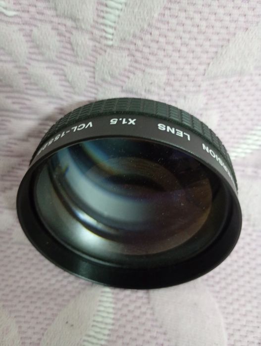 Teleconversor usado em câmera de Video