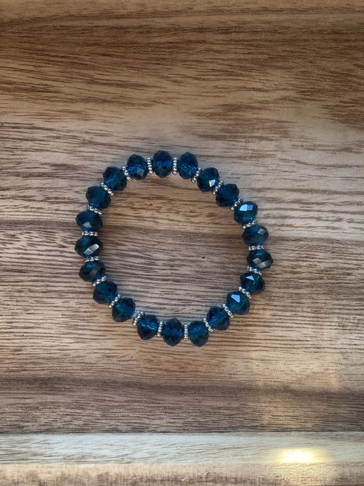 Pulseira de missangas.