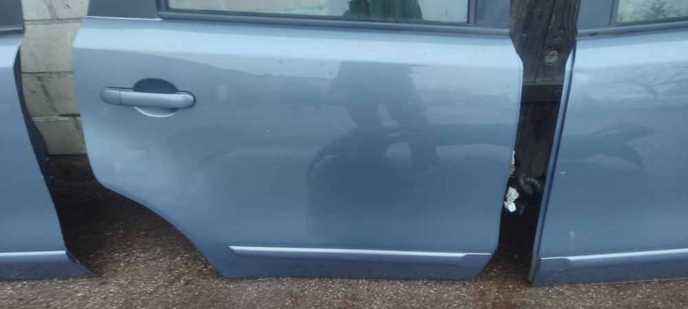 Nissan Note E11 drzwi lewe prawe przód lub tył B52G