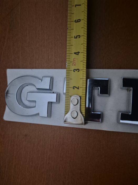 nowy napis GTI  do VW na tylna klape  + szablon montażowy