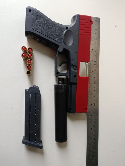Детский игрушечный пистолет с глушителем Glock