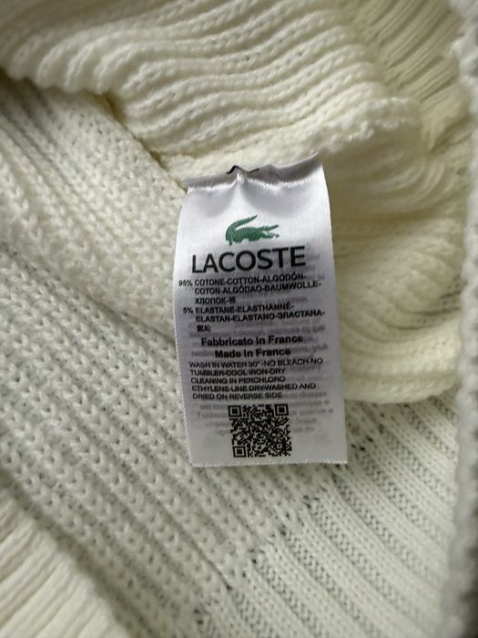 Kremowy sweter Lacoste