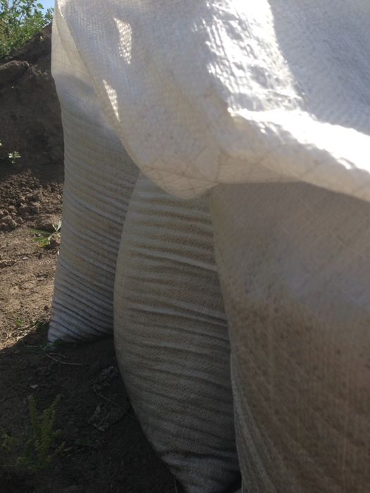 Чернозем и перегной в мешках