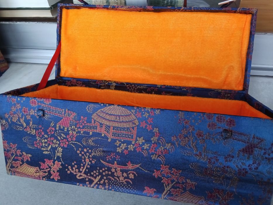 Três caixas forradas com tecido Oriental