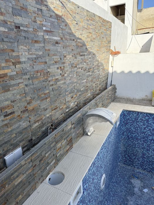 Construçao e reablitačaõ de piscna canalizaçao e casas de makina