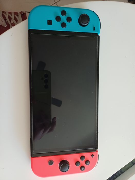 Nintendo Switch OLED Azul e Vermelha