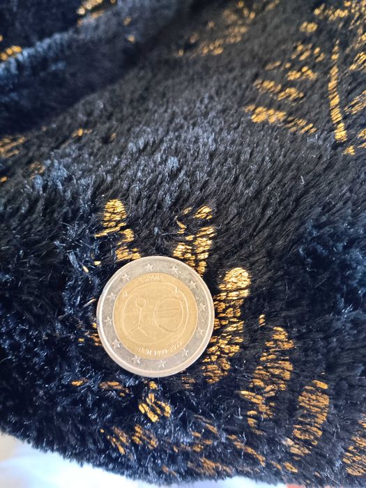 Moeda 2euros humana