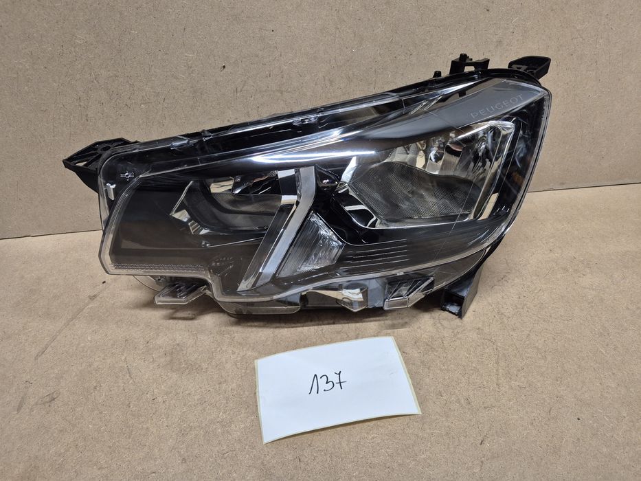 Peugeot Partner rifter lampa reflektor lewy europa