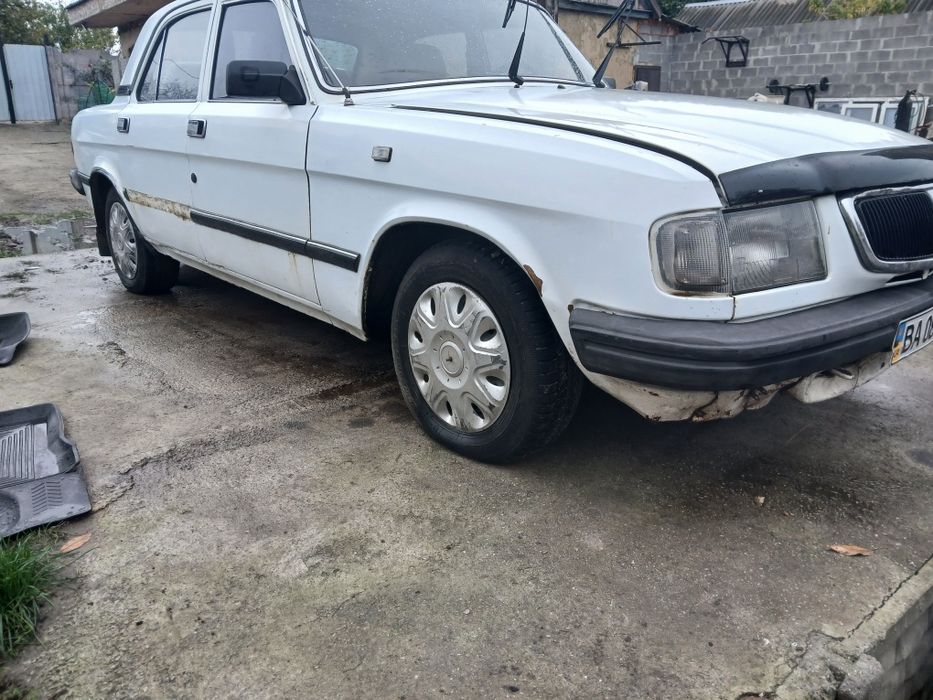 Газ 3110 бензин  бела