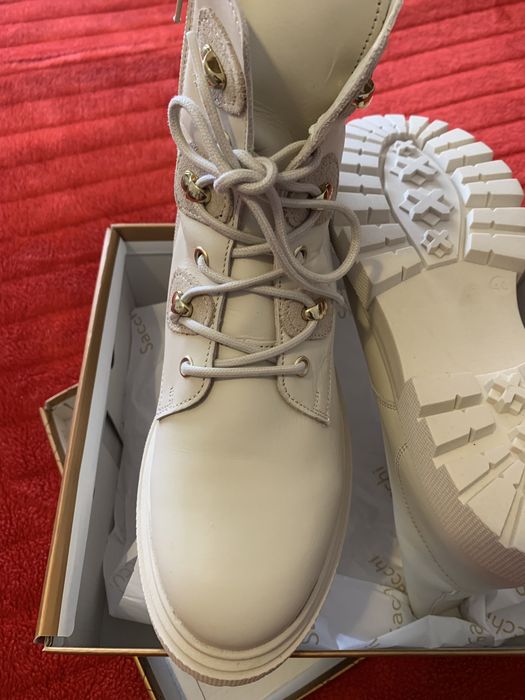 Botas sacchi cano alto novas na caixa