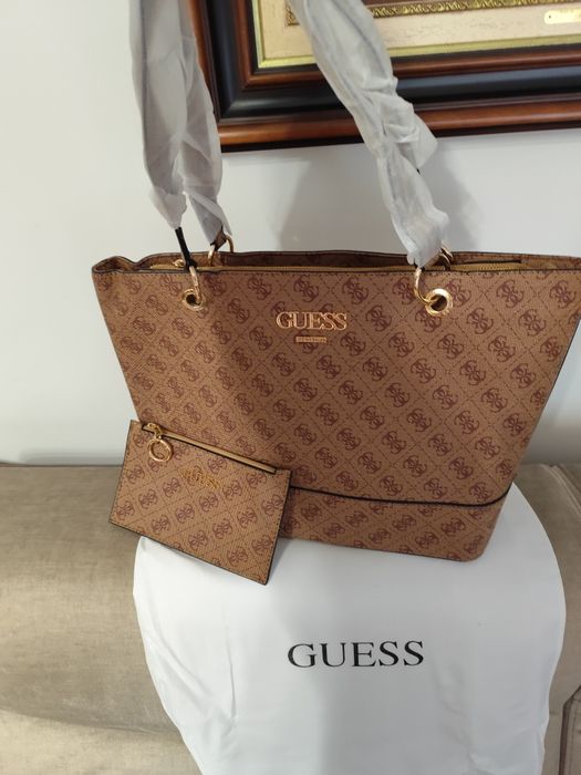 Malote Guess camel tem porta moedas incluído,saco de pó é magnífica