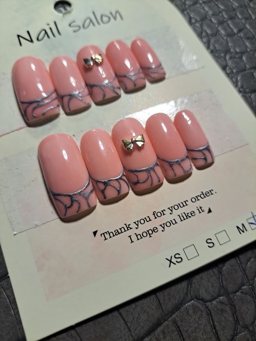 Press on nails. Tipsy.