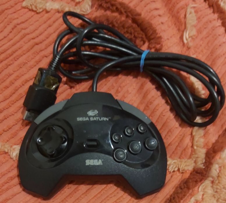 Sega Saturno Comando.