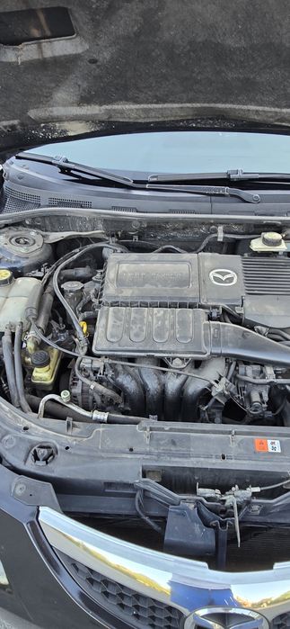 Машина Mazda 3