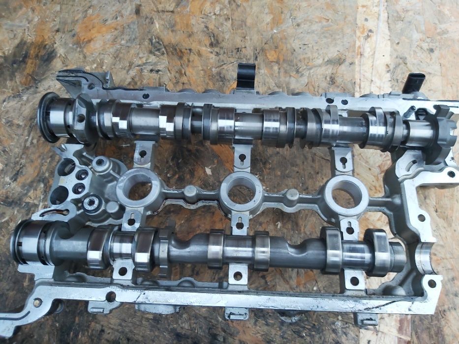 Wałek wydechowy lewy AUDI A4 A5 Q5 A6 3.2 cal cala 06E109102BA